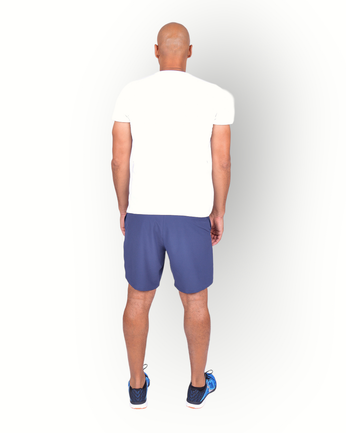A man wearing a white short sleeve t-shirt with the text 'RE-BORN' on the front.