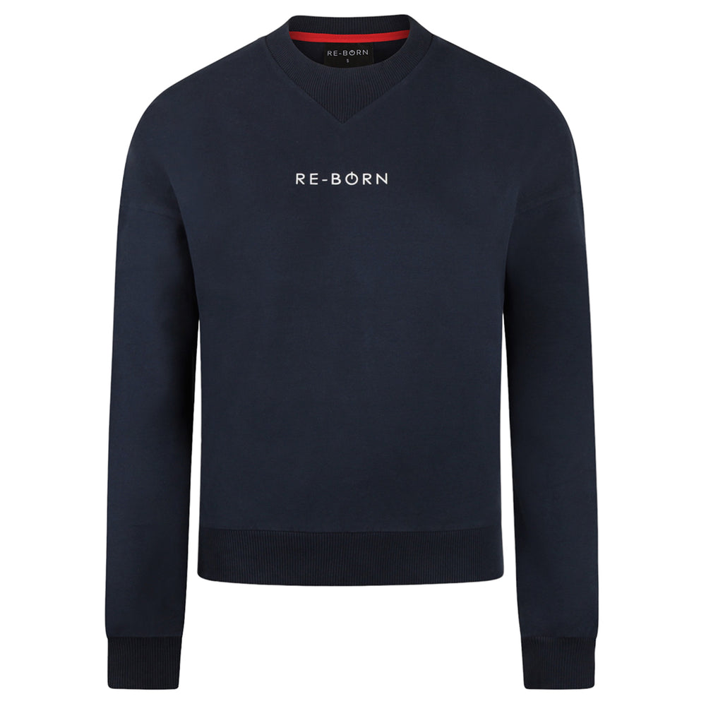 A navy long sleeve crew top with rib detail and a crew neckline in a super soft fabric.